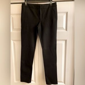 Antonio Melani Black fitted stretchy straight pant. Size 6. Zipper pockets.